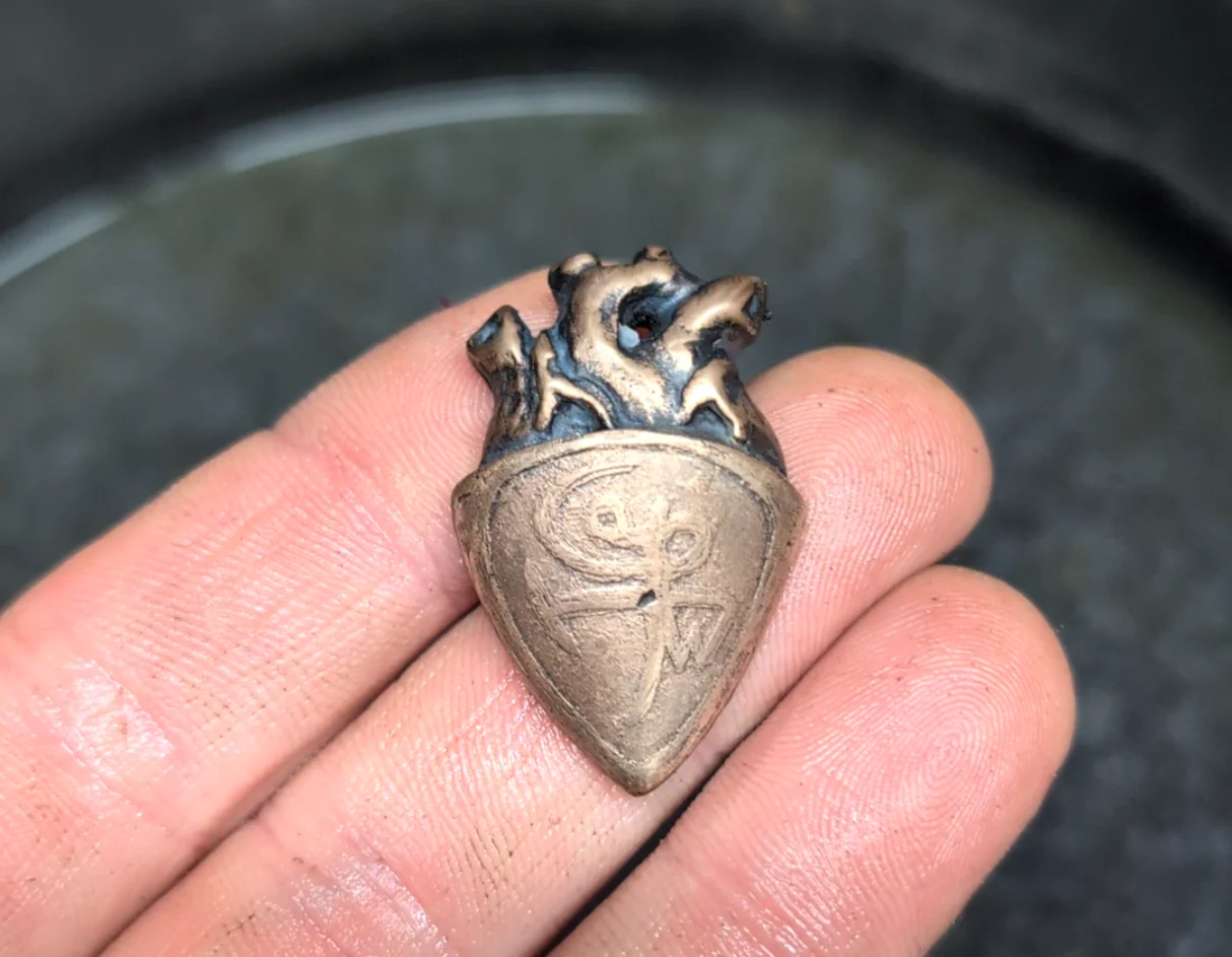 Forged heart-shaped protection amulet by BorboroForge